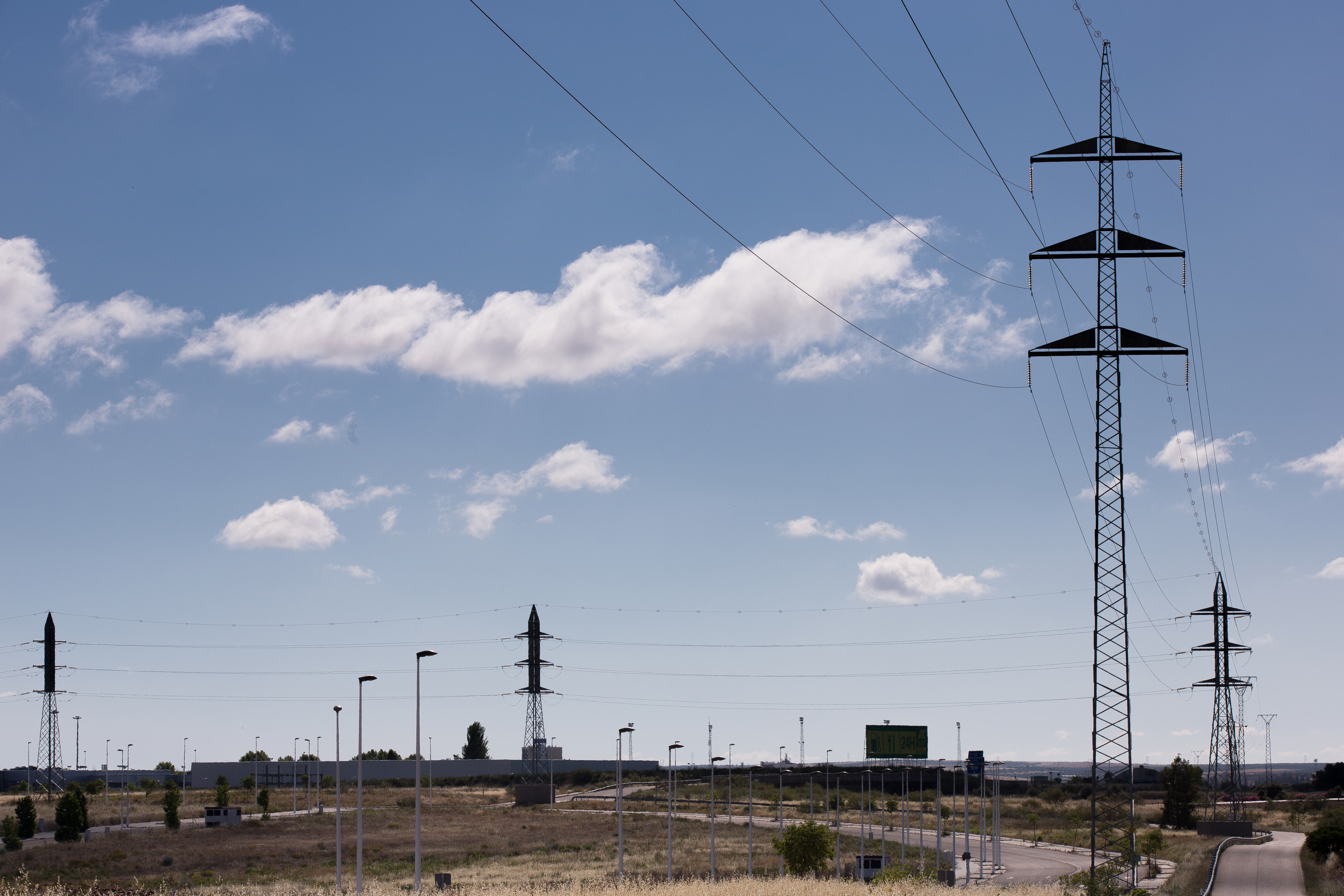 High voltage towers in a valley as a landscape
